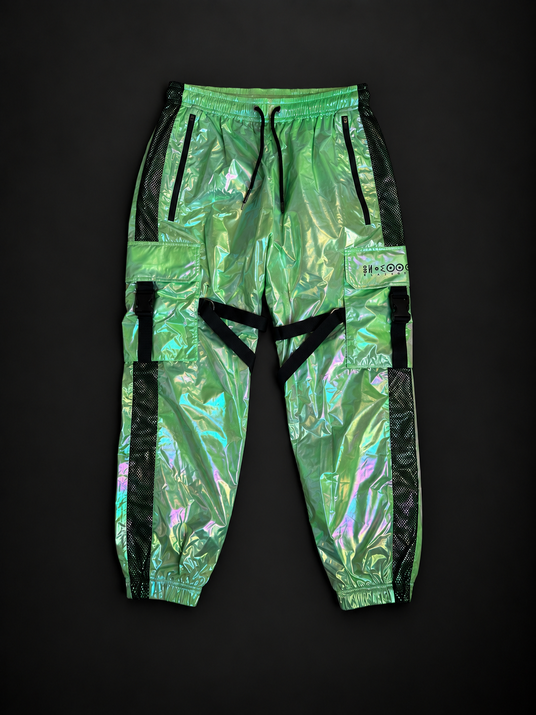 ELAISSAOUI PARA DIZA matching iridescent trousers, front view with cargo pockets, black straps and elasticated cuffs.