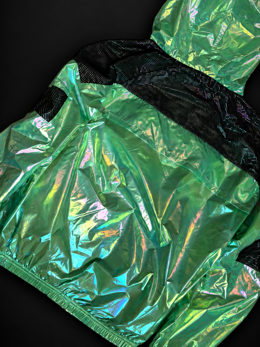 ELAISSAOUI PARA DIZA jacket back detail showing the black mesh shoulder panel.