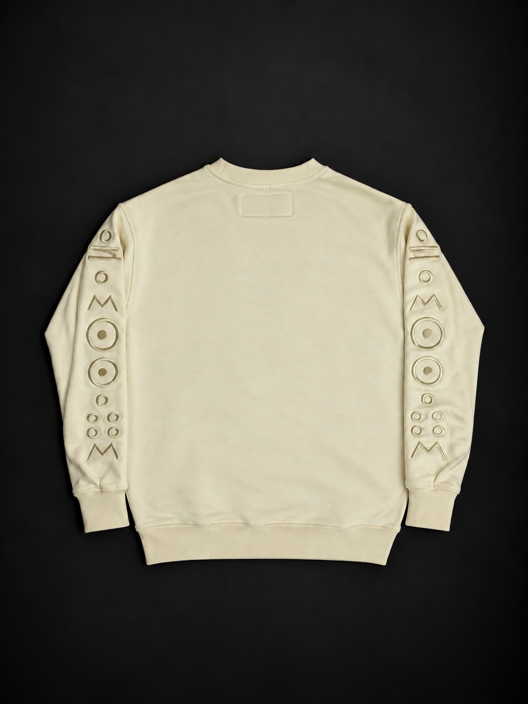 ELAISSAOUI TICHKA Desert Ivory pullover, back view with the embroidered sleeves.