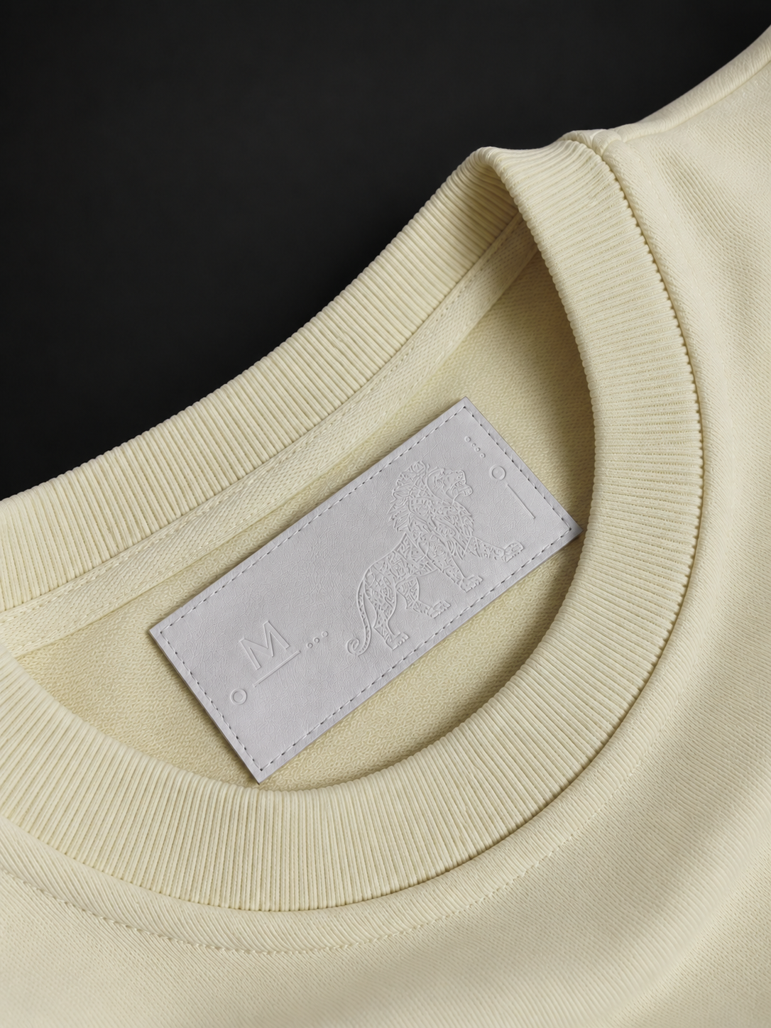 ELAISSAOUI TICHKA ribbed crew neck collar with the interior neck label.